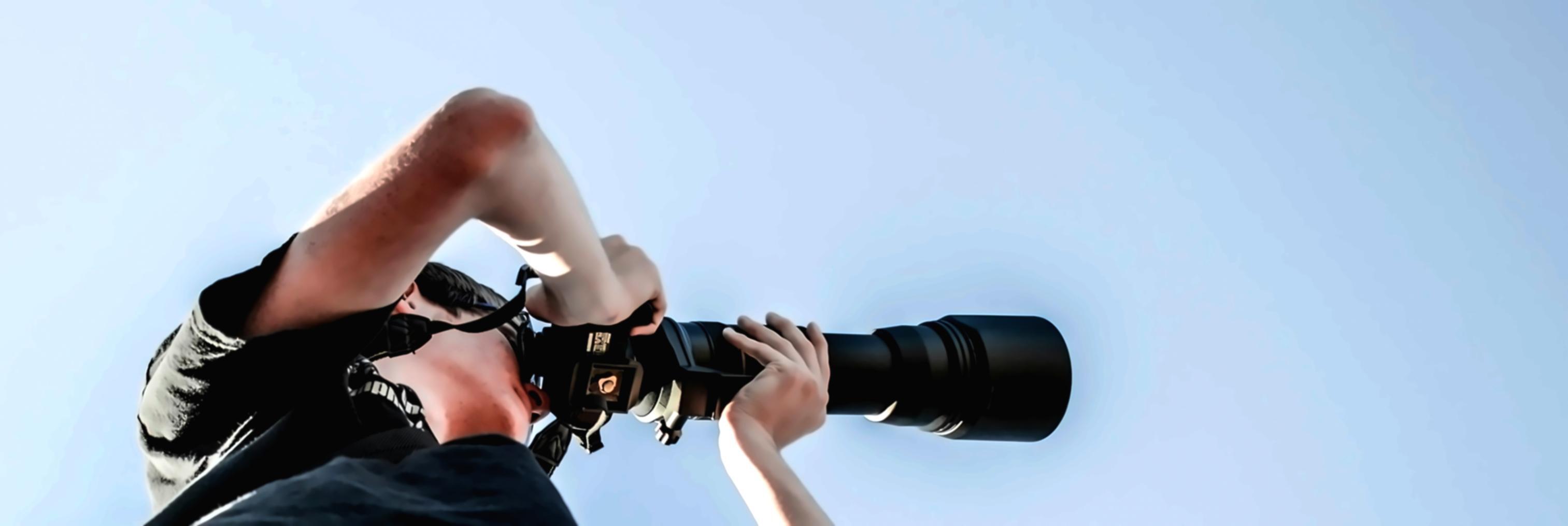 Behind the scenes of professional portrait photography setup showing attention to detail and professional equipment